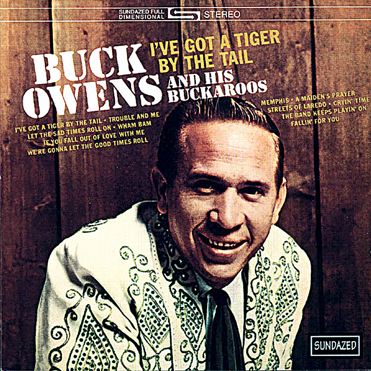 	I've Got a Tiger by the Tail - Buck Owens	